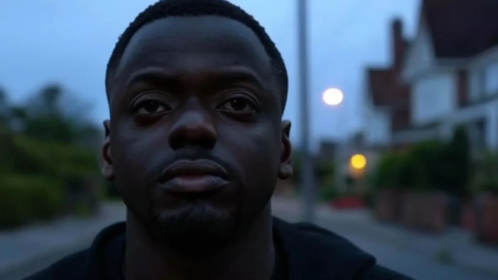 Untitled Jordan Peele Project: "Daniel Kaluuya, Lupita Nyong'o, Steven Yeun in suspenseful setting"